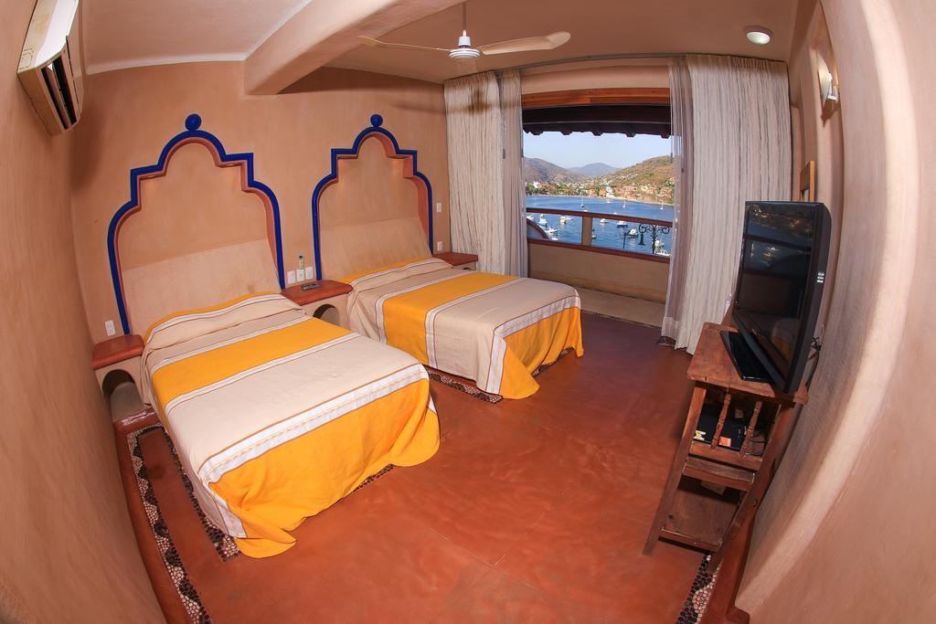 Villa Del Pescador Zihuatanejo Szoba fotó